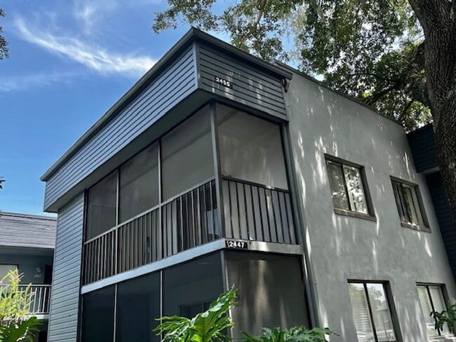 Building Photo - MOVE IN NOW!! 2ND FLOOR CORNER 2x2 UNIT WITH SCREENED IN PORCH!