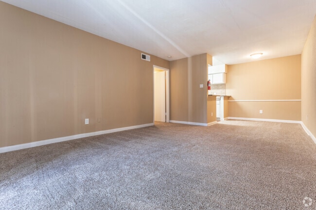 Sala de estar, cocina y comedor - The Crest Apartments