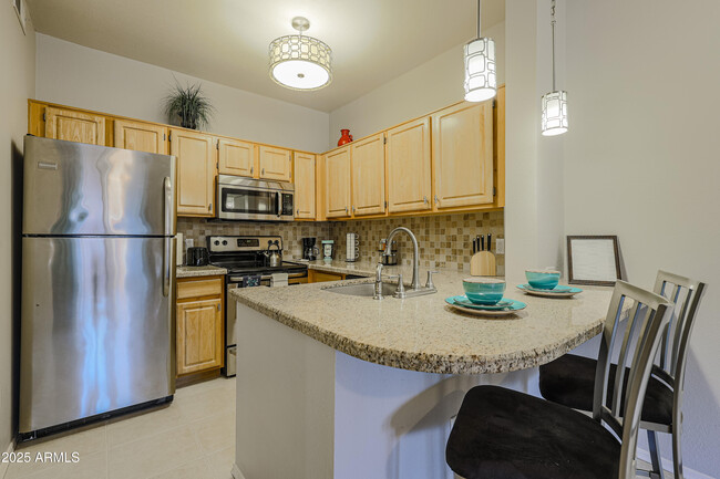 Foto del edificio - 14950 W Mountain View Blvd