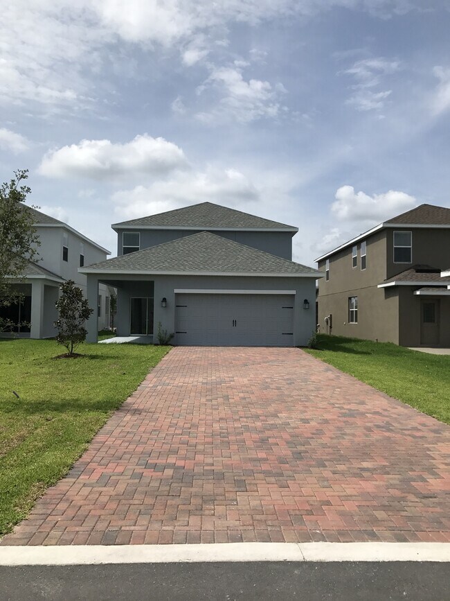 Foto del edificio - 5/3 Lake Nona/Moss park Home with FREE Lawncare, Internet, Cable and Phone