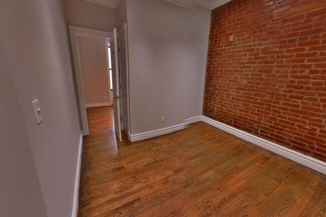 Foto del edificio - 221 E 23rd St