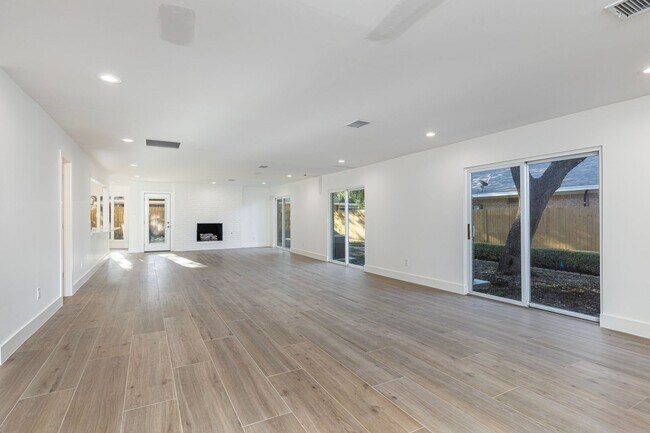 Building Photo - NEWLY RENOVATED DUPLEX ACROSS FROM OVERTON...