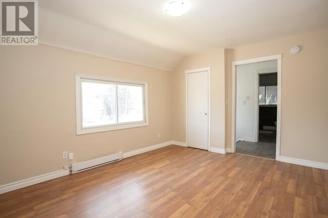 Building Photo - 2 Bedroom Upper-Level Unit – Parking & In-Unit Laundry – $1,549/month + Utilities