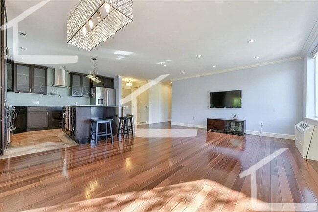Building Photo - (Promo: $500 Utility Rebate!) STATE OF THE ART Gem in Coolidge Corner!  Covered Parking. Ht & HW ...