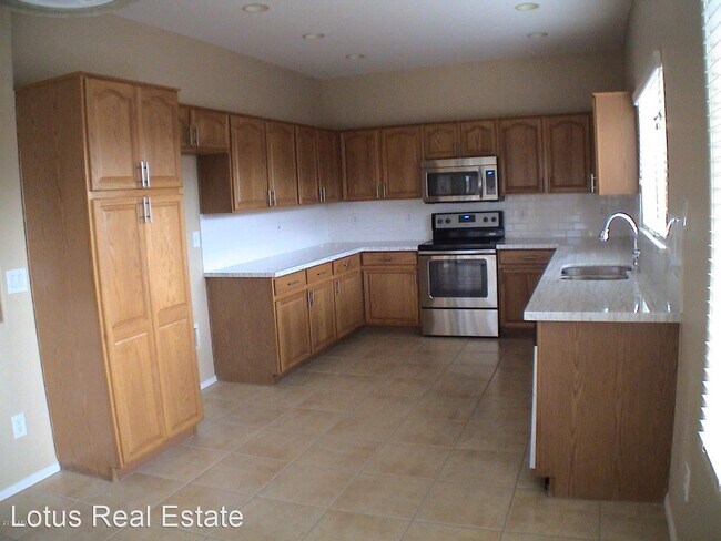 Foto del edificio - 4 br, 2 bath House - 5201 W Sunland Ave.