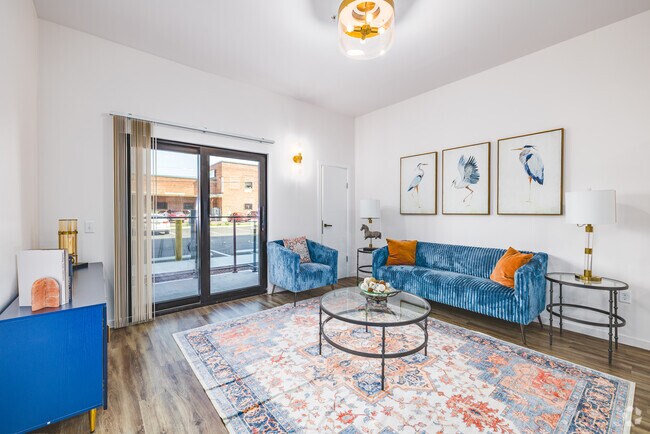 1 dormitorio, 1 baño - 786 pies cuadrados - Sala de estar - Webster Station Flats