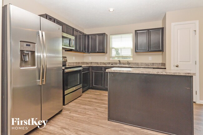 Building Photo - 7079 E Mardenis Drive S