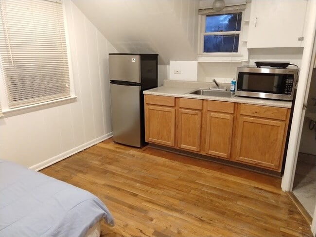 Full kitchen with stainless steel appliances. - 1457 Eaton St