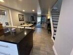 Vista de la cocina de la gran sala - 828 W 38th Ter