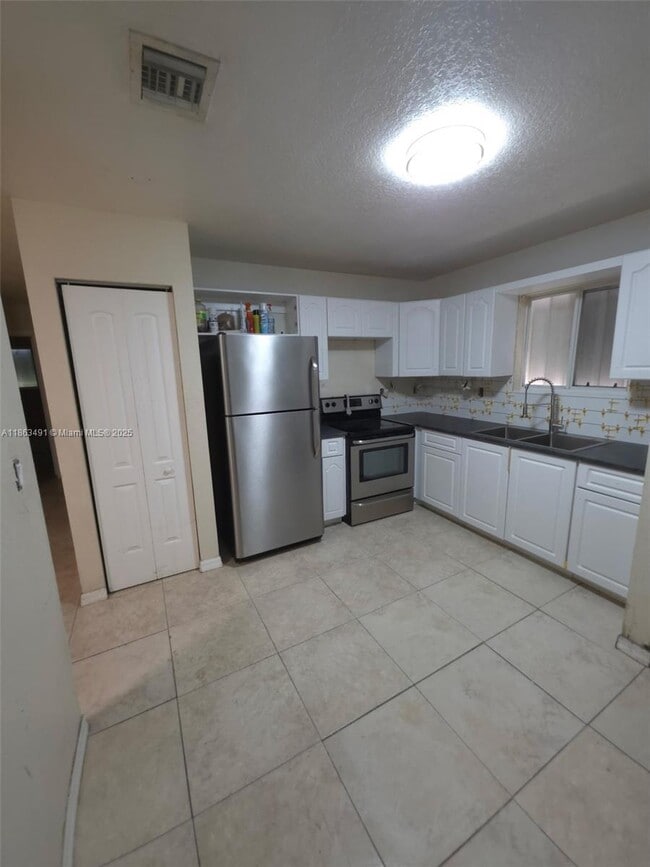 Building Photo - 1465 NW 59th St