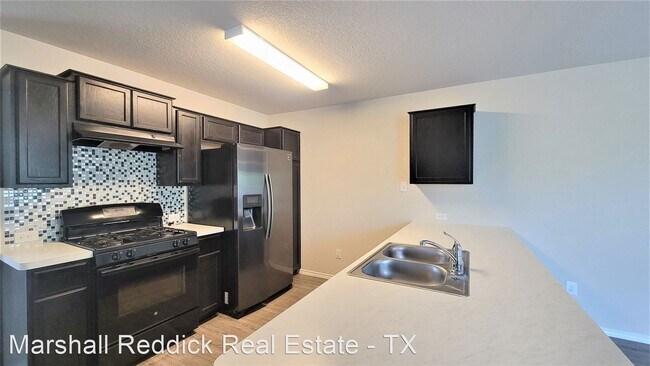 Foto del edificio - 4 br, 2 bath House - 7435 Summer Blossom Ct