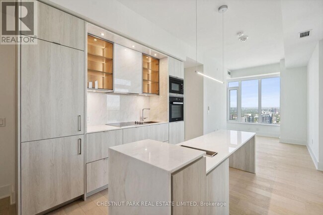 Photo du bâtiment - 11-4311 Yorkville Ave