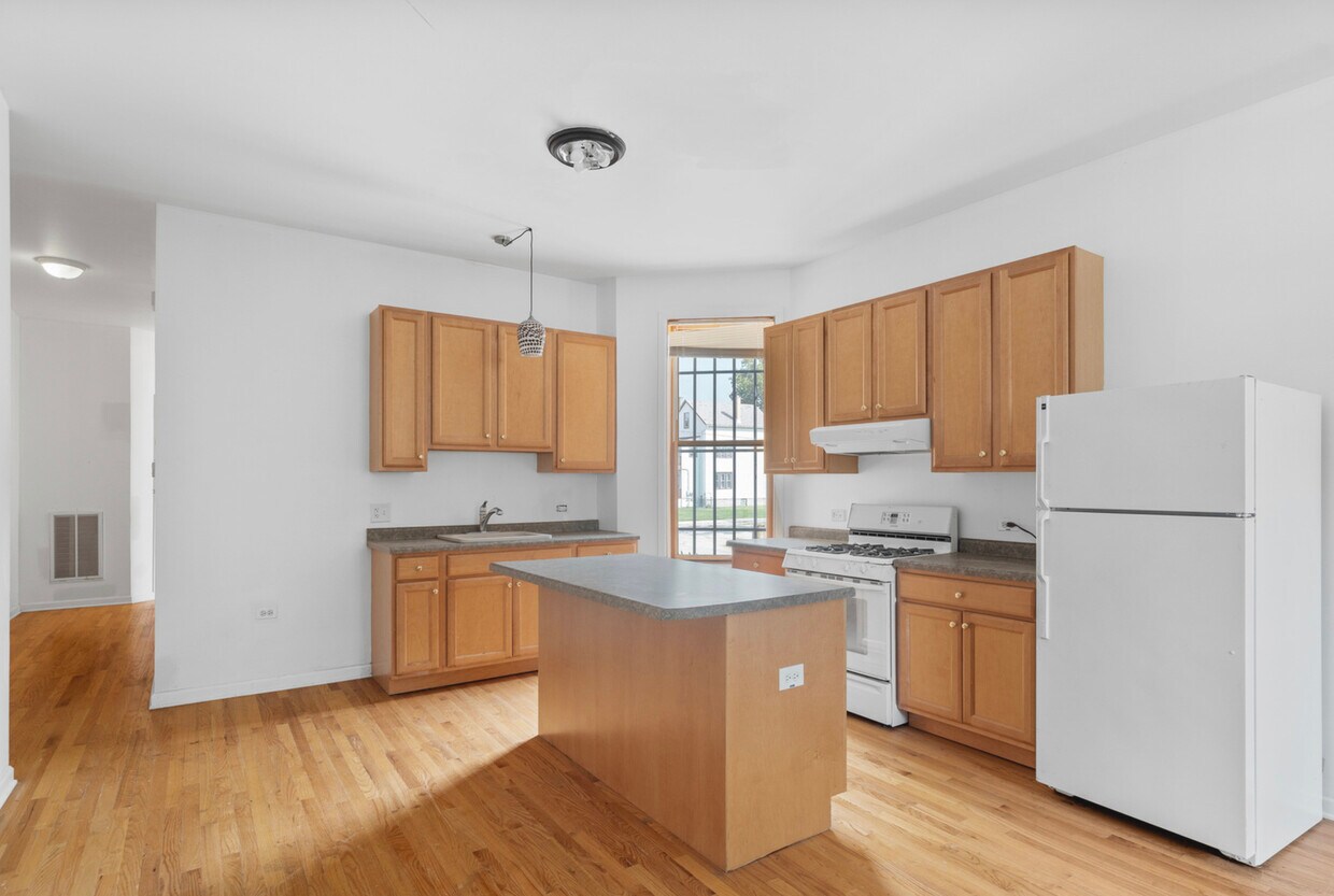 Foto del edificio - 716 W 51st St