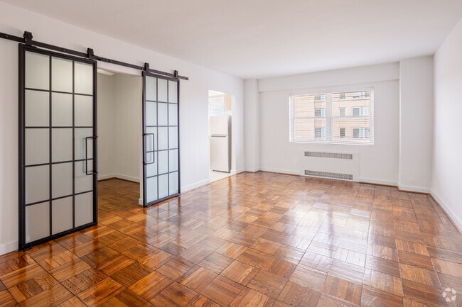 1BR, 1BA - 767 SF - Living Room - Skyline Towers Apartments