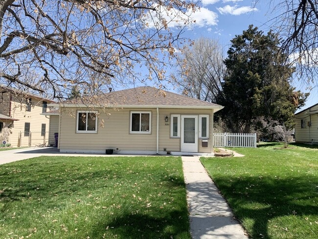 Photo - Evolve Real Estate: Available 6/6/2026! Quaint 3 Bedroom Ranch with Huge Yard in University Hills... House