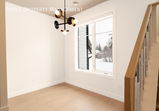 Photo du bâtiment - BRAND NEW 3 BEDS + DEN, 2.5 BATHS TOWNHOUSE | SCANDINAVIAN ELEGANCE IN BOWNESS