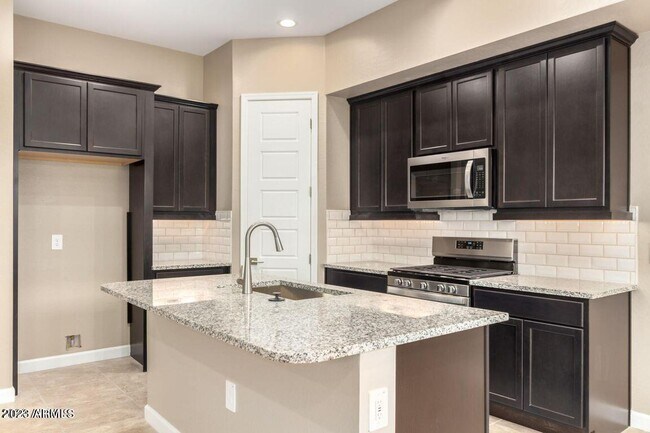 Building Photo - 4863 E Village Dr