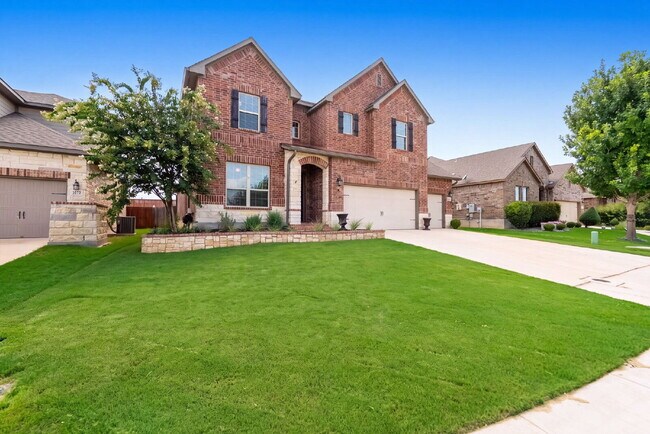 Building Photo - No Rear Neighbors, 3 Car Garage, a Chef's Kitchen, and Room for Everyone