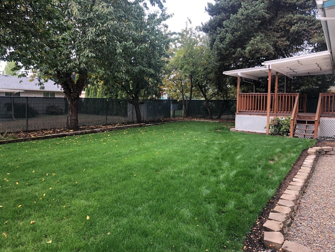 Primary Photo - Updated Four Bedroom Home with New Lawn an...