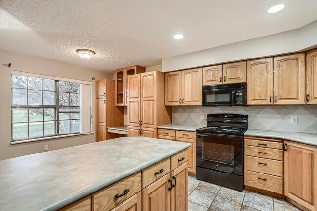 Building Photo - 2528 South Vaughn Way, Unit D