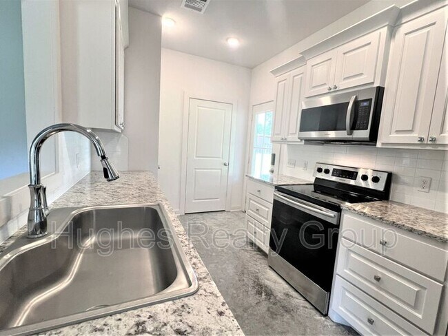 Foto del edificio - 7677 River Ridge Dr