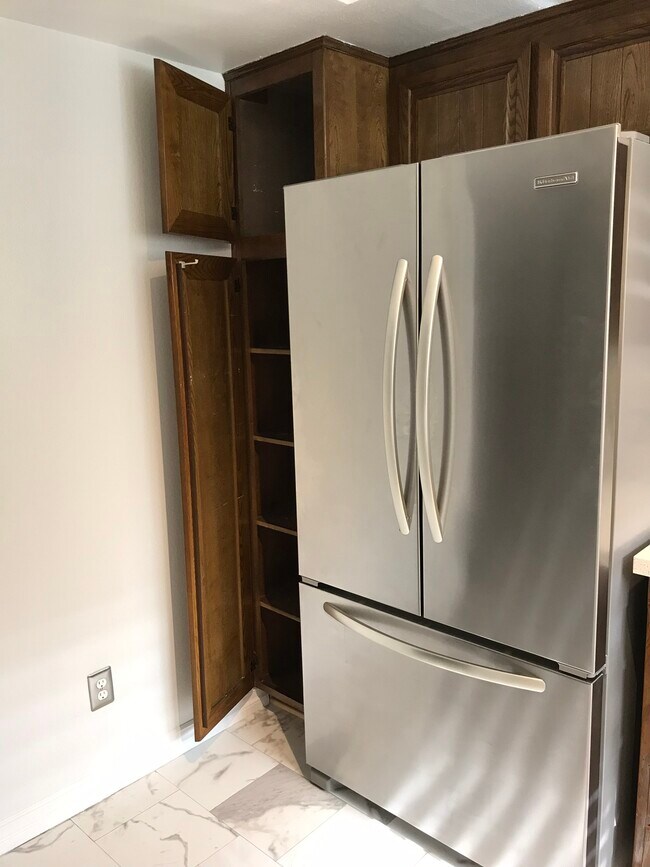 Refrigerator and cabinets - 12616 Pacific Ave