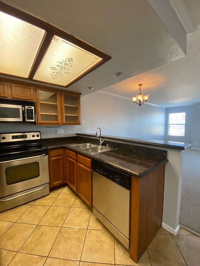 Building Photo - The Palms Condo