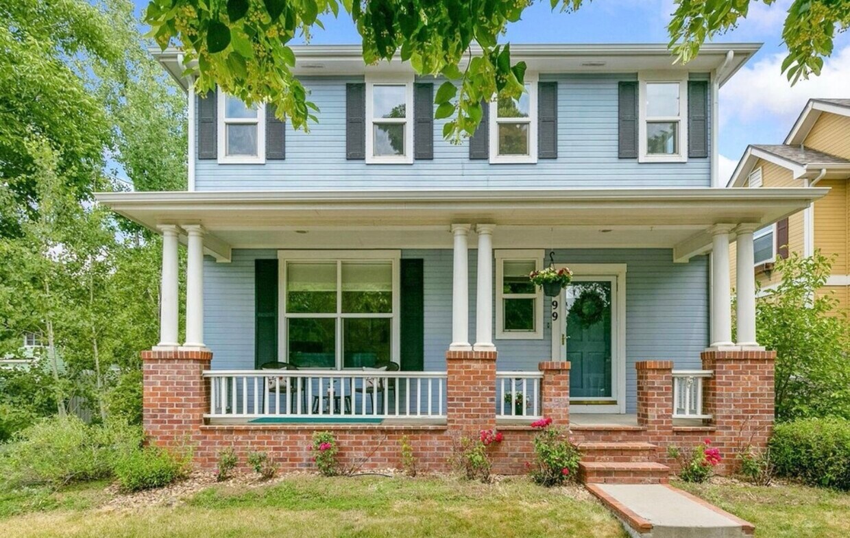 Exterior of house with porch. - 4599 W 36th Ave