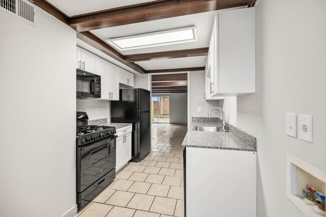 Building Photo - East Townhomes and Apartments
