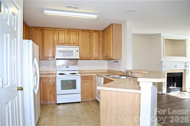 Foto del edificio - 8727 Wandering Creek Way