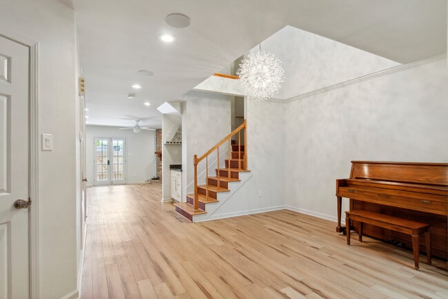 Front Foyer, Dining Area looking towards the Den and backyard. - 4502 Park Dr N