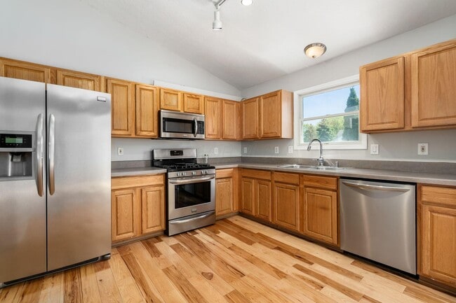 Building Photo - 5385 Genoa Farms Blvd