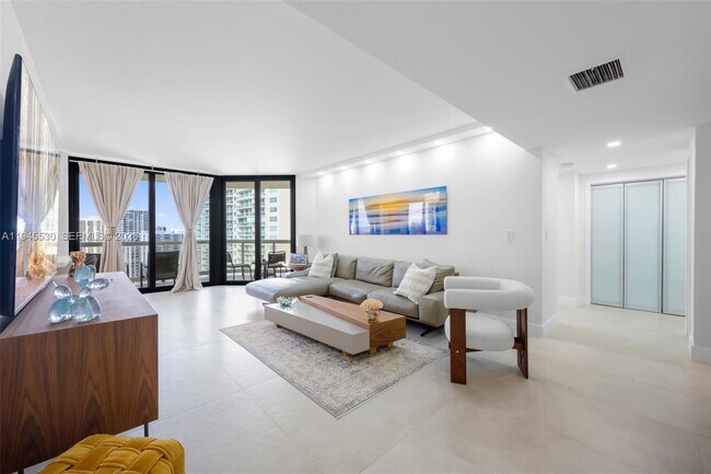 Building Photo - 20191 E Country Club Dr