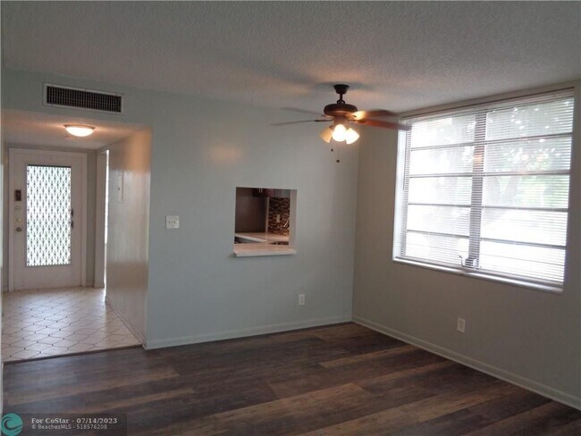 Building Photo - 5890 NW 64th Ave