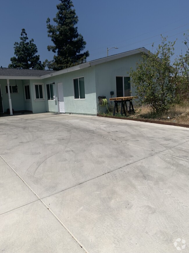 Building Photo - 8857 Comanche Ave