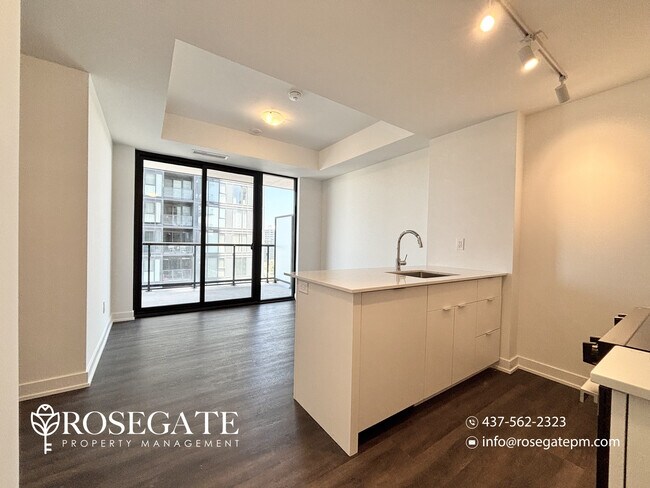 Building Photo - Modern 1-Bedroom Condo with Balcony, Parking & Locker – Burlington