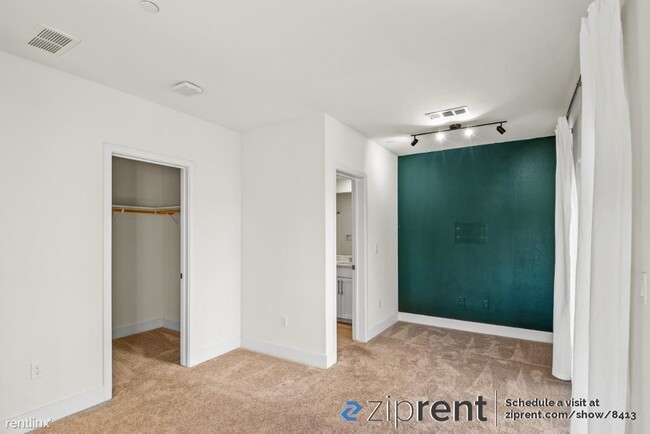 Building Photo - 3 br, 3.5 bath Townhome - 8595 Leeward Way...