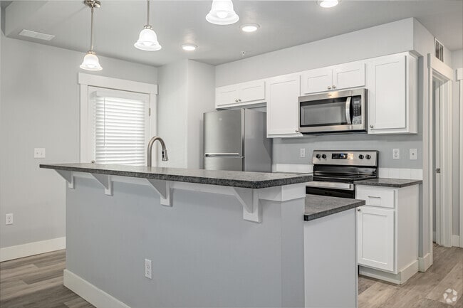 2 habitaciones, 2 baños - 996 pies cuadrados - Cocina - The Village Apartments and Townhomes