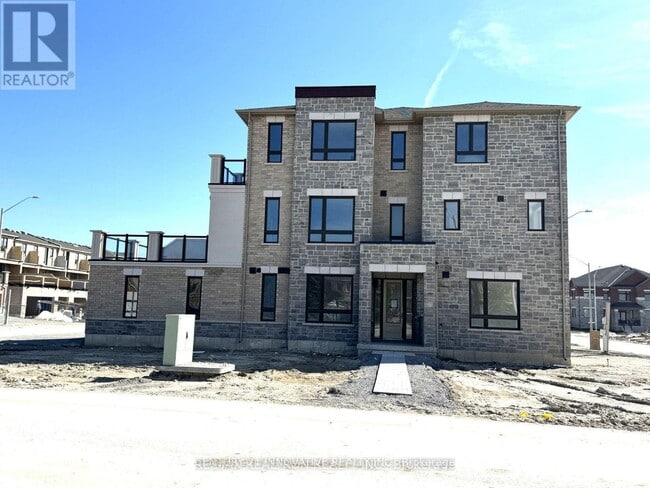 Photo du bâtiment - 114 Robert Eaton Ave.