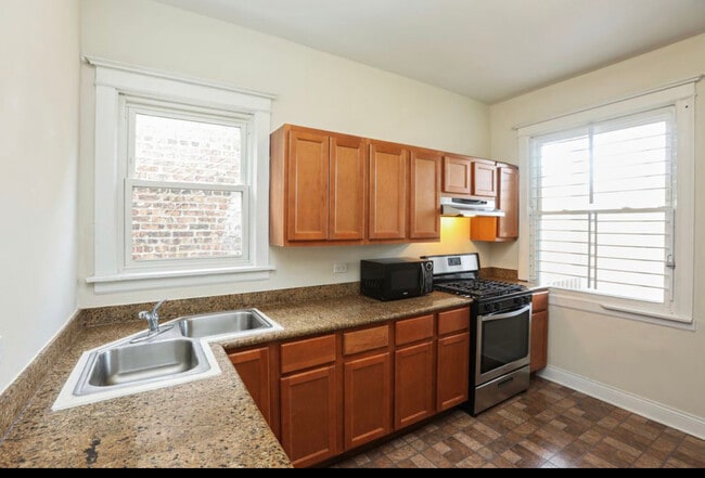 Building Photo - 6115 S Evans Ave