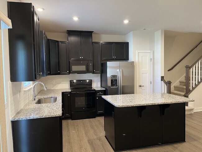 Building Photo - "Charming 3-Bedroom Townhouse with 2.5 Baths on Riverbrook Drive – Your Perfect Gallatin Retreat!"