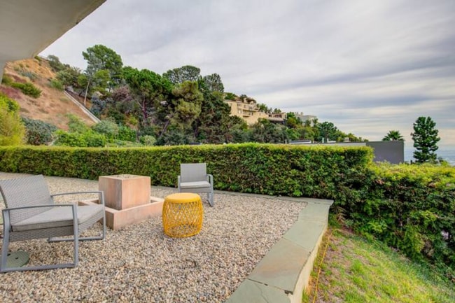 Enjoy coffee or cocktails outside in one of our many sitting areas with expansive views of Los Angel - 1868 N Doheny Dr