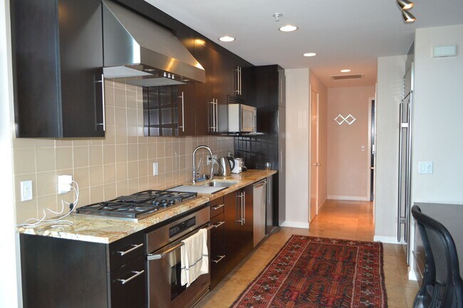 Building Photo - Stylish Studio Loft in Sapphire Tower – Do...