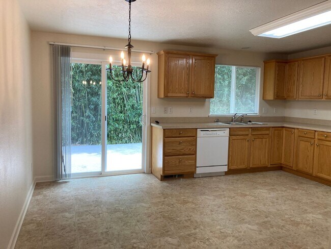 Building Photo - Three Bedroom Home, Landscaping Included!