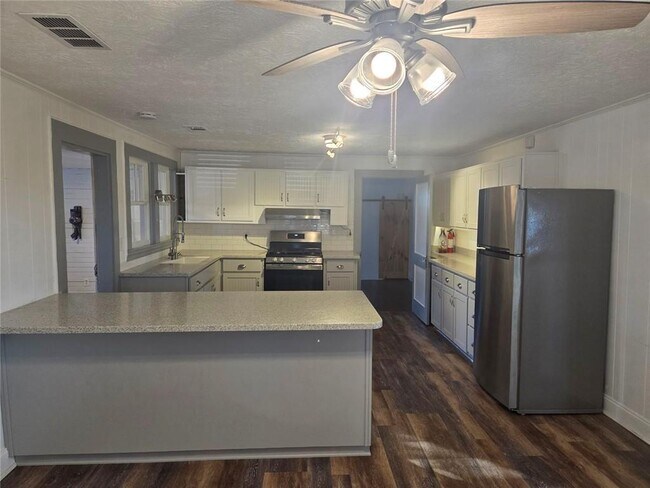 Foto del edificio - 5465 Jot Em Down Rd