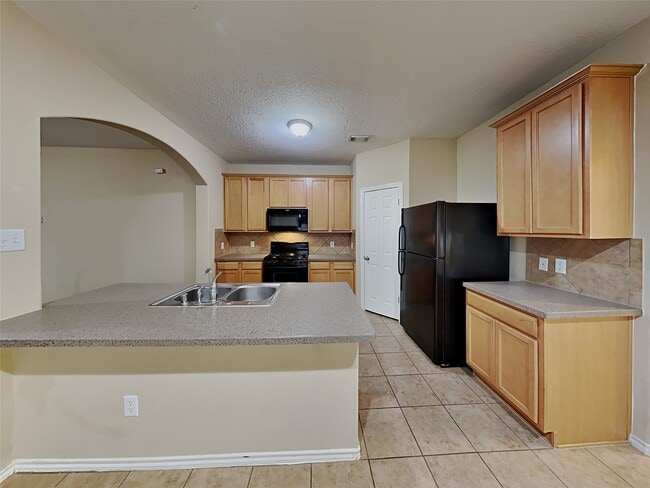 Foto del edificio - 9215 Birch Springs Dr