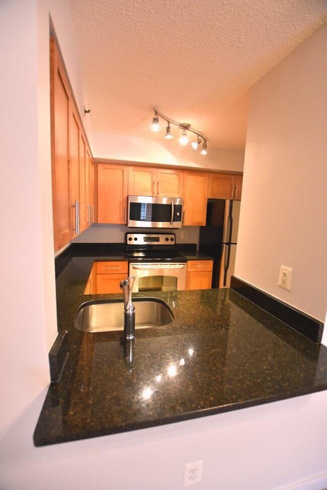 Building Photo - Fantastic 11th Floor Condo at The Chase in...