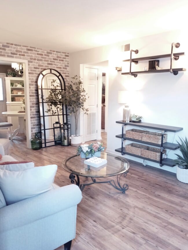 Custom Wood/Pipe Entertainment Center, New Floors, Faux Brick Accent Wall - 2314 Cooper Ter