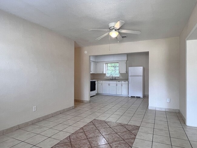 Building Photo - Three-Bedroom Home with Spacious Family Bo...