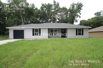 Building Photo - 6567 NW 61st Ln